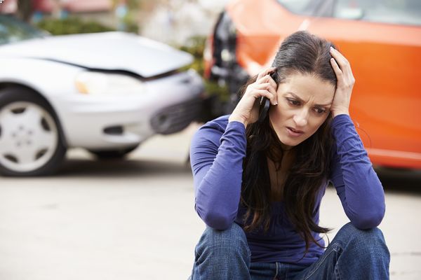 A woman calling East Macon car accident lawyers after a crash