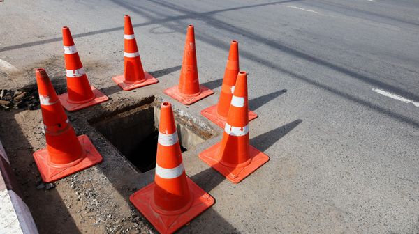 A hole in the street, hazard that could lead to a premises liability claim