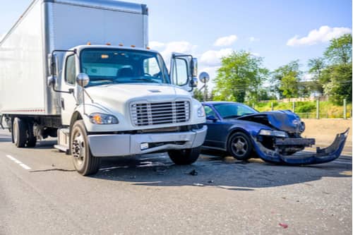 Concept of Warner Robbins truck accident lawyer, car hit by truck