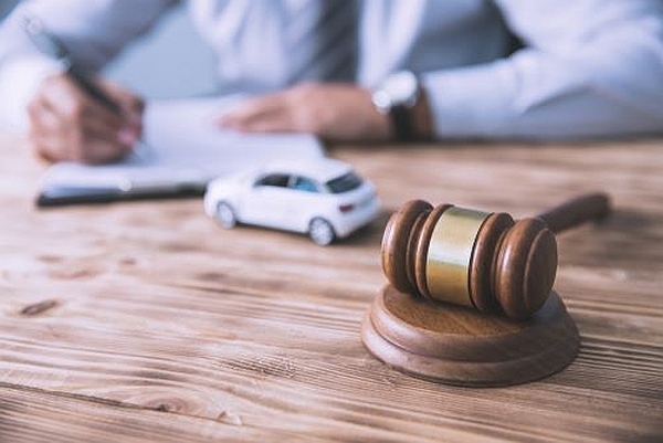 A Macon car accident lawyer filing a lawsuit