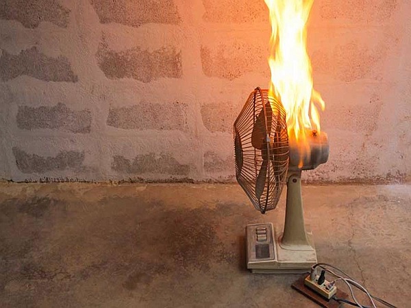 Burning desk fan, Atlanta product liability lawyer concept